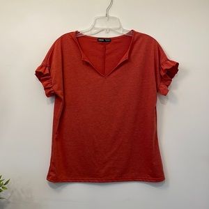 Adorable. NWOT. medium. Orange/rust ruffle sleeve top
